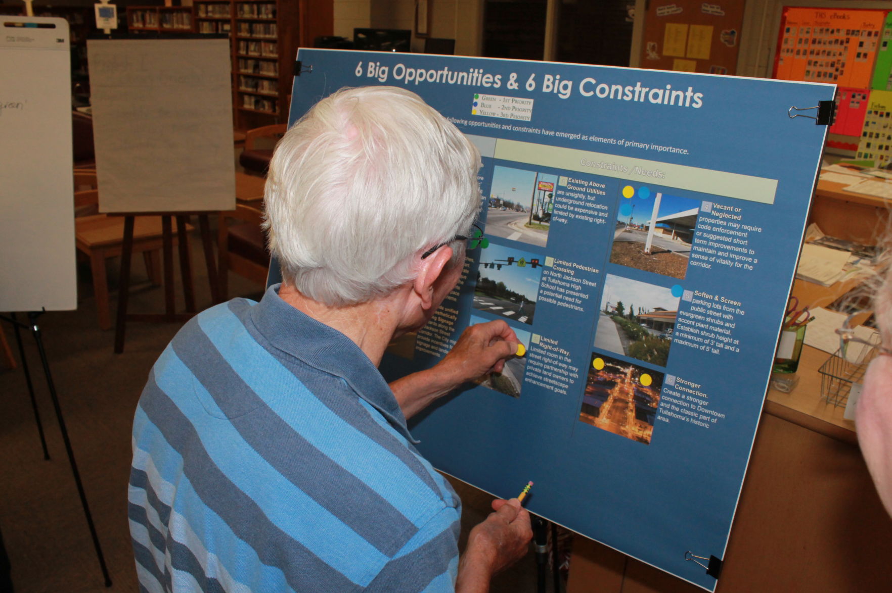 Ralph Graham placing sticker.JPG